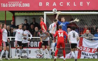 Hereford goalkeeper Curtis Pond rises high to make a save during his side’s match against Brackley Town