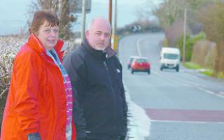 Heather Thompson and Craig Preedy, beside the A49 at Much Birch, hoping for a safer year on Herefordshire’s roads.
