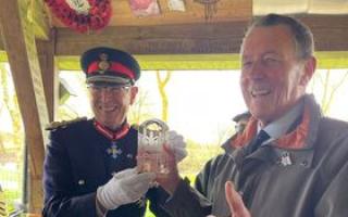 Mike Colton (right) receives the Kings Award from Lord Lieutenant of Staffordshire, Ian Dudson