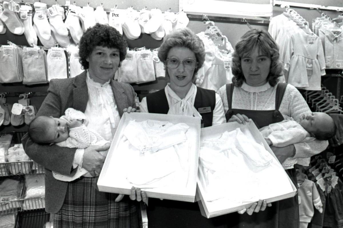 Prince Harry christening gowns being sold in Boots, Hereford. 24th October 1984.