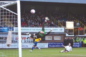 Trent McClenahan's shot flashes past Lincoln keeper Ben Smith for Hereford United's second goal. Report and more pictures - Sports Times 1 and 2. 	Picture by STEVE NIBLETT