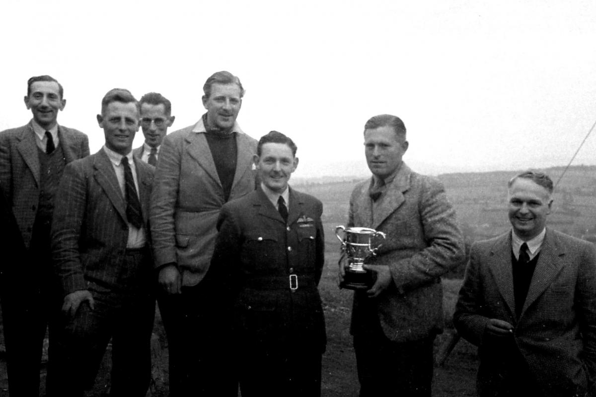 Herefordshire Amateur Golf Championship, Kington Golf Club 19th May 1946. County champion Mr Evans holding the cup.