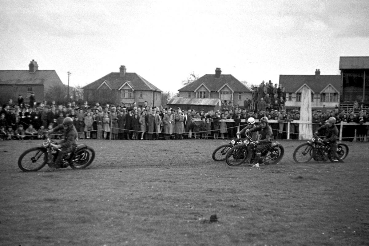 Motorcycle Grass Track Meeting semi-final. Hereford Racecourse (Grandstand Road in the background). 2nd April 1945.