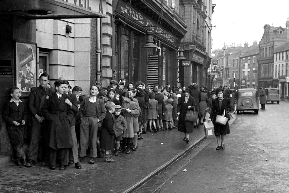 Queue outside the Odeon Theatre for children's matinee film. December 27th 1945.