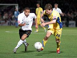 Lionel Ainsworth runs at Ben Parker.