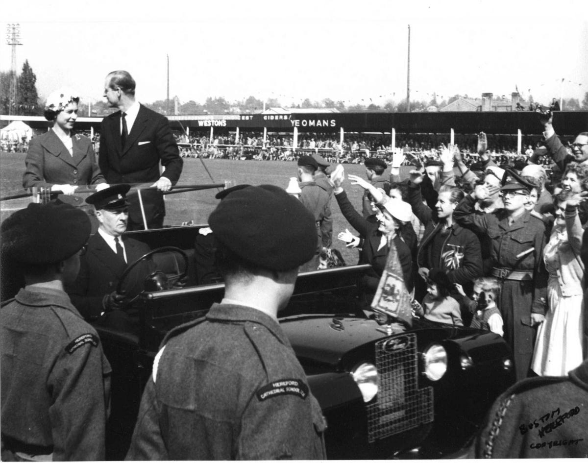Edgar Street is packed to the rafters as the Queen and Duke of Edinburgh parade in an open-topped jeep.
Photo; Derek Evans Archive at the Herefordshire Archive and Records Centre; Herefordshire Libraries