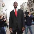 Dwain Chambers arrives outside the High Court in London