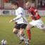 Ben Smith goes past Ben Clark. Ben Smith goes past Ben Clark.