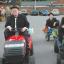 Cutting a dash, Ryan Holland, Nathan Ewen and Matthew Burford arrive by lawnmower.