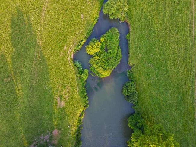 Michael Peet’s stunning aerial drone picture captures the area around the river Lugg, Lugg Bridge and quarry in Herefordshire as the sun sets on a summer evening.
