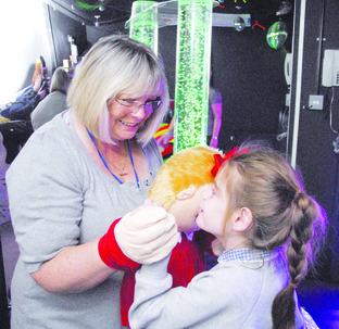 Teaching assistant Mary Hewitson and Hannah Doyle.