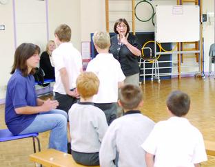 Head Sian Bailey with the choir at Blackmarston School.