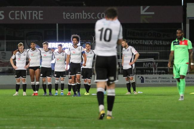 Hereford players look on during the penalty shootout. Picture: Steve Niblett/Hereford FC