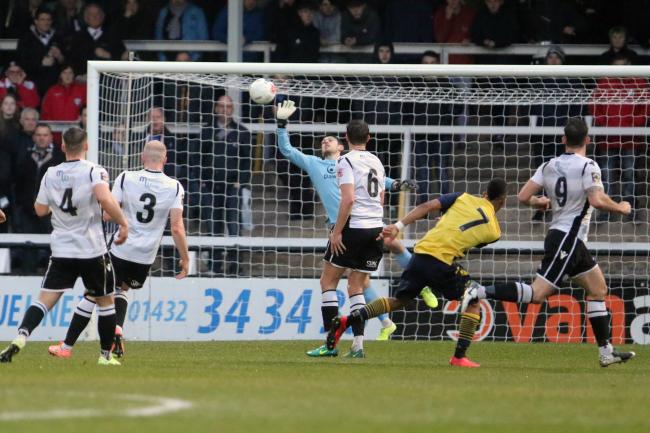 Brandon Hall making a flying save against Guiseley. He will return to his former side Kidderminster Harriers on Boxing Day. Picture: Steve Niblett/Hereford FC