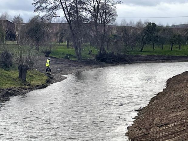 Hereford Times: Officials at the river Lugg in December 2020