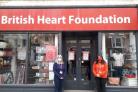Staff outside the British Heart Foundation shop in Welshpool.