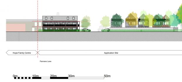 Hereford Times: Top Garage in Bromyard could be demolished to make way for new houses and apartments. Picture: K4 Architects/Herefordshire Council 