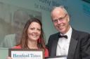 Dr Tony Blower receivionmg his award last year from Hattie Hayes of the sponsors, the Katherine Harriett agency
