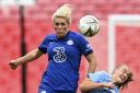 Chelsea's Millie Bright (left) and Manchester City's Georgia Stanway battle for the ball during the English FA Women's Community Shield soccer match between Chelsea and Manchester City at Wembley stadium in London, Saturday, Aug. 29, 2020. (Ju