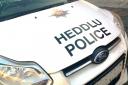Police investigating fatal crash on Powys road