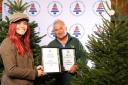 Red Shepherdess Hannah Jackson presents awards to Colin Griffith of Dinmore Hill Christmas Trees, Hereford. Picture: Russell Sach