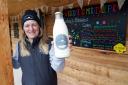 Lucy Mason outside the Merrivale Farm shop in Little Birch with a fresh pint of Merrimilk. Picture: Rob Davies