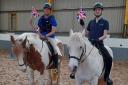 Herefordshire RDA riders Ieuan Griffiths and Dan Bailey with horses Lady and Blue. Picture: RDA Hereford