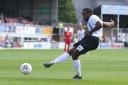 Tyrone Barnett scoring one of his two penalties. Picture: Steve Niblett/Hereford FC