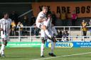 Jack Evans celebrates Hereford's 4-2 victory at Boston with Orrin Pendley. Picture: Andy Walkden/Hereford FC