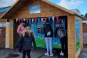 Customers using the new Whole Moo World milkshake vending machine in Weeping Cross Lane in Ludlow. Picture: Whole Moo World