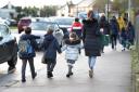 A school near Hereford has been visited by Ofsted as it checks to see if it is still good.
Schoolchildren walking to school. Pupils hand in hand with their mum.  Stock picture: PA Wire