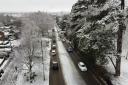 A drone picture of cars driving up a snow-covered Aylestone Hill on March 9