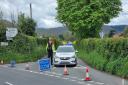 A road closure was put in place after an e-bike rider was seriously hurt