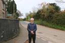 Cllr Alistair Cameron is pictured in Begelly where residents have been waiting 'years' for traffic calming measures.