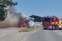 Firefighters tackle a coach fire on the A449 near Ledbury
