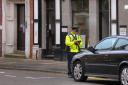 a traffic warden in action
