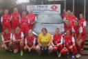 Hereford Pegasus Ladies pictured in their new kit for this season with a representative from shirt sponsor BMW Cotswold