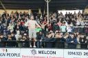 The Hereford fans celebrate a 1-0 victory over National League side Rochdale at Edgar Street.