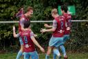 Westfields’ players celebrate after Rory Thompson pulls them level against Fairford Town.