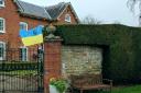house with Ukrainian flag