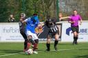 RNC’s Eesa Amjid weaving his way through two Charleroi defenders on his way to scoring