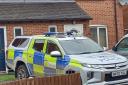 Police outside a house in Cherrybrook Close, Hope-under-Dinmore after a 35-year-old woman was found dead