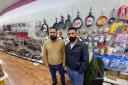 Sushil Kumar (left) and Zulfiqar Hussain in the shop