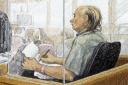 Robert Pickton takes notes his trial in 2006 (Jane Wolsack/The Canadian Press/AP)