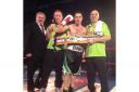 Dean Evans celebrates his win with, from left: Promoter Keith Mayo, Hereford Boxing Academy's Neil Gibbons and trainer Joe Wrona