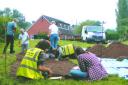 Volunteers at work during investigations into two priory sites in Ewyas Harold and at Dulas Court.