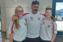 Hereford karate fighters Charlotte Colbert, Chris Rowan and Danielle Dunn who came away with world championship titles