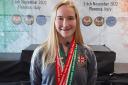 Charlotte Colbert with her medals from the 12th WUKF European Karate Championships
