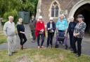 Supporters at the outside toilet which has caused dispute over its positioning at St Matthew's church, Marstow. Picture: Rob Davies