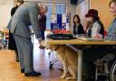 King Charles III meets a guide dog called Bobby during his visit to Royal National College for the Blind (RNC) in Hereford